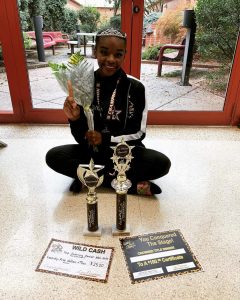 dancer with trophies